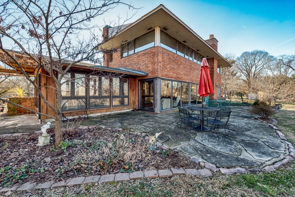 Photographs of a Harris Armstrong designed mid-century home on Jamestown Acres in Florissant, Missouri for Dielmann Sotheby's International Realty agent Ted Wight